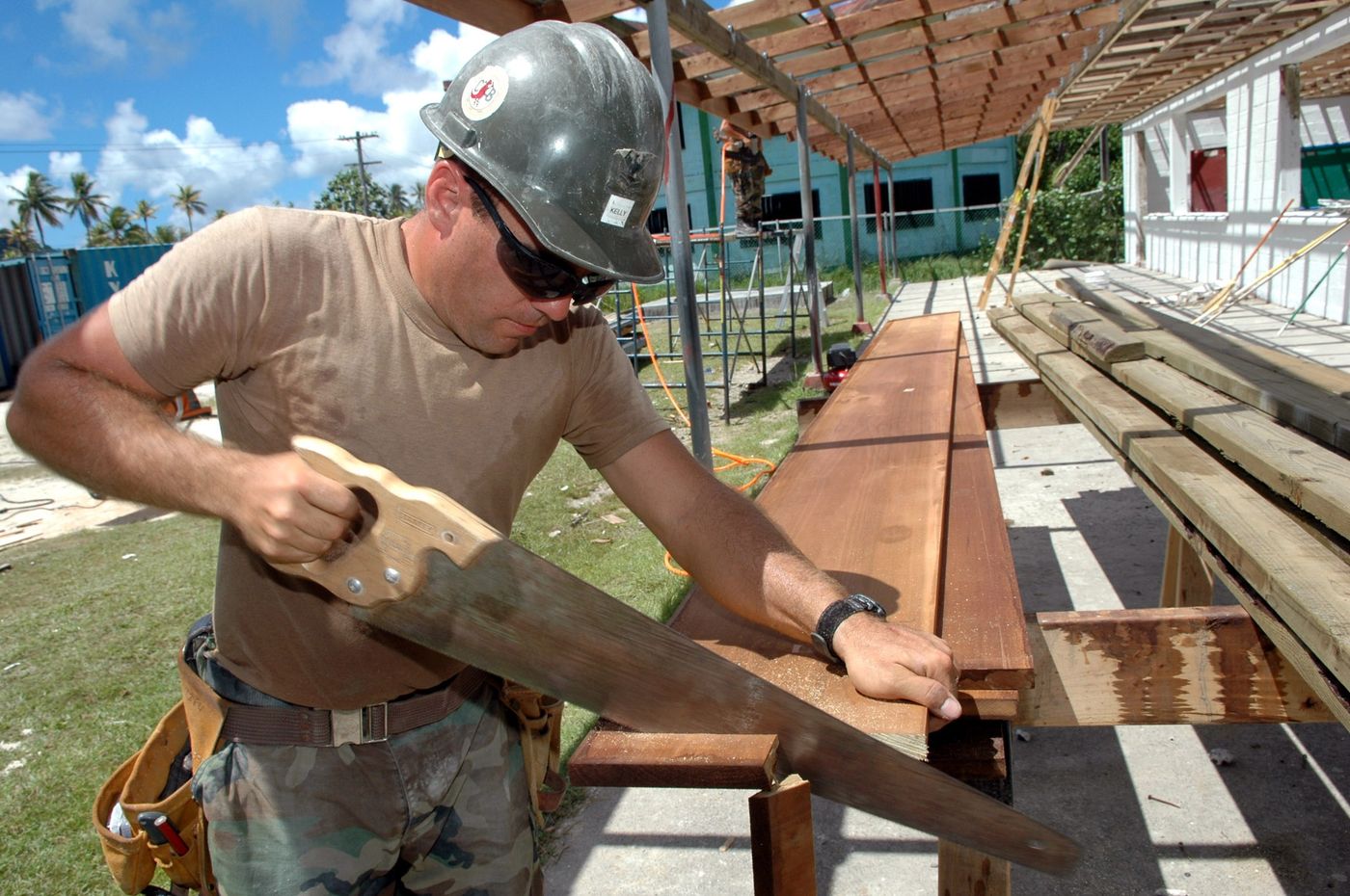 Man building with wood
